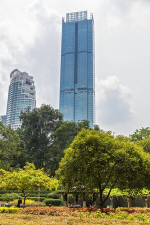 22 Apr 2019. Kuala Lumpur, Malaysia. The twin towers of Petronas. Central Park.のeditorial素材