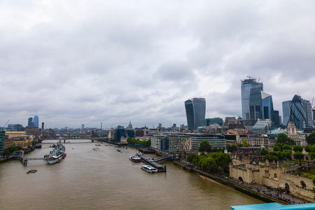 LONDON, UK - JULY 8, 2019: London cityscape with Thames River Embankment with old and modern buildings.のeditorial素材
