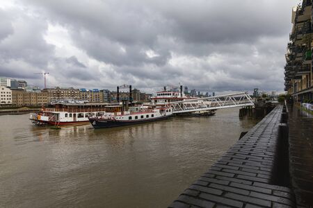 LONDON, UK - JULY 8, 2019: London cityscape with Thames River Embankment with old and modern buildings.のeditorial素材