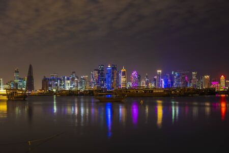 18 Juanuary 2020. Doha city skyline illuminated at night. Qatar, Middle Eastのeditorial素材