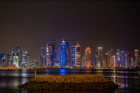 Doha city skyline illuminated at night. Qatar, Middle Eastのeditorial素材