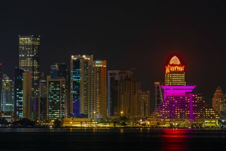 18 Juanuary 2020. Doha city skyline illuminated at night. Qatar, Middle Eastのeditorial素材