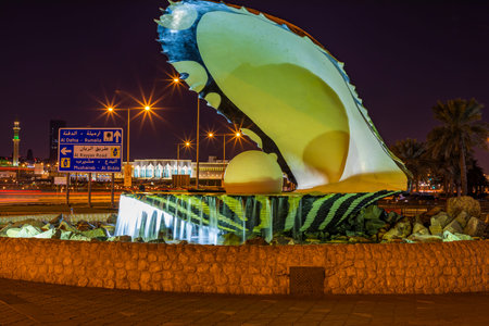 Doha, Qatar - 18-01-2020: Famous monument Shell with Perl is landmark of Doha, Qatar. Monument of Shell at night.のeditorial素材