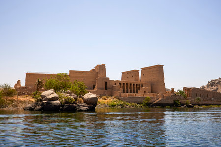 Edfu, ASWAN, EGYPT - 24 April 2021:  Temple of Isis at Philae island, in Lake Nasser, with bas-reliefs of Isis, Horus and the pharaoh.のeditorial素材