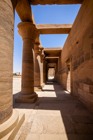 Edfu, ASWAN, EGYPT - 24 April 2021:  Temple of Isis at Philae island, in Lake Nasser, with bas-reliefs of Isis, Horus and the pharaoh.のeditorial素材