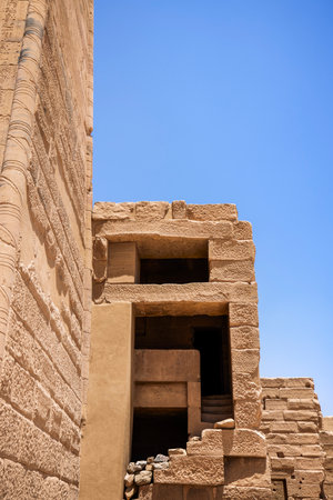 Edfu, ASWAN, EGYPT - 24 April 2021:  Temple of Isis at Philae island, in Lake Nasser, with bas-reliefs of Isis, Horus and the pharaoh.のeditorial素材