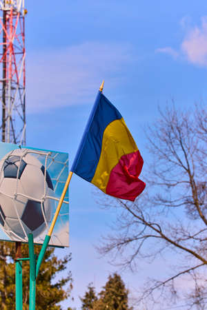 the flag of Romania with a soccer ballの写真素材