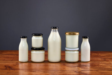 various dairy products in glass jars, organic products.の写真素材