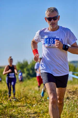September 26, 2021: Romania, Marcea, running competition Edition no. one. Promotion of sport at local level, 6 km race.のeditorial素材
