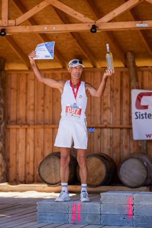 September 26, 2021: Romania, ArgeÈ, running competition Edition no. 1. Promoting sport at local level with the participation of people of different ages and genders (Podium)のeditorial素材