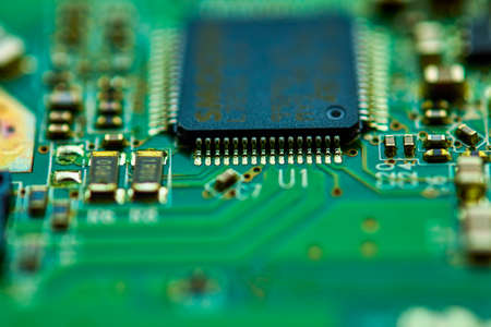 image with electronic circuits in blur, selective focus.の写真素材