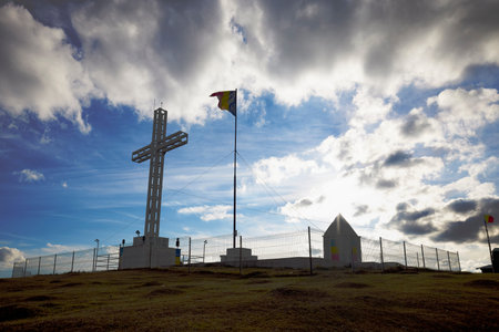 a large cross built in honor of the heroes who fell in World War II in Runcu Romania