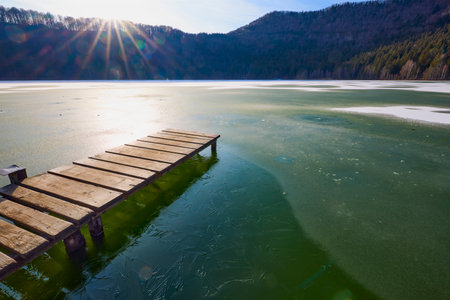 Beautiful landscape with St. Ana Lake in Romania, volcanic lake in December.の写真素材