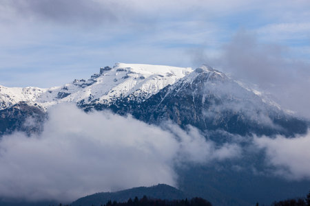 Beautiful landscape with the Bucegi mountains in Romania with the ridges covered with snow.の写真素材