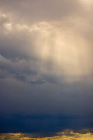 background with sun rays among the clouds