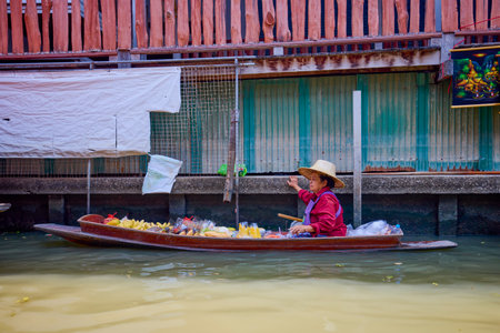 Damnoen Saduak - Thailand May 23, 2023. On the canals of Damnoen Saduak Floating Market by boat.のeditorial素材