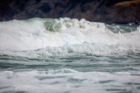 Abstract landscape with sea waves at the shore on a windy day.の写真素材