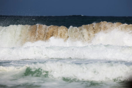 Abstract landscape with sea waves at the shore on a windy day.の写真素材