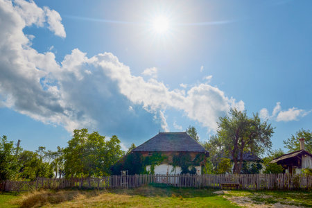 Landscape with old houses with local architecture from Romania somewhere in Transylvania.の写真素材