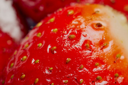 Strawberries in a plate on a table ready to be eaten.の写真素材