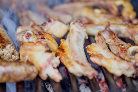 meat mix on the grill while it is cooked.の写真素材