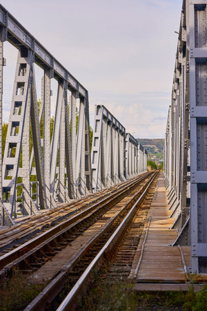 image of an old metal railway bridge
