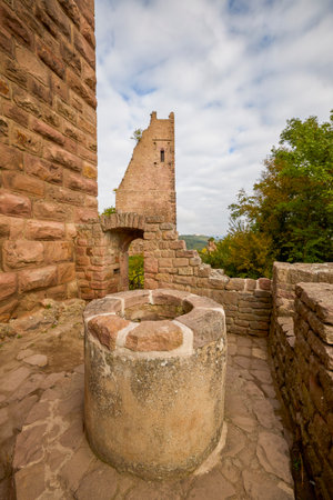 The ruins of a medieval castle located on a mountain in France, Alsace areaの写真素材