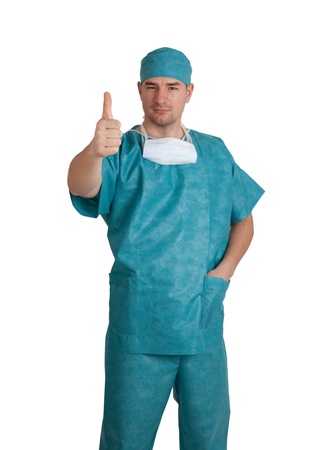 Doctor in scrubs thumb up. Isolated on white background.の写真素材