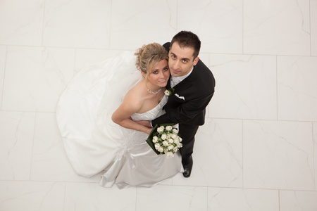 Happy bride and groom on their wedding dayの写真素材