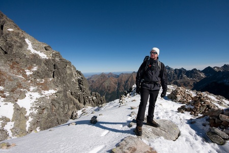 sportive man on the mountain trekの写真素材