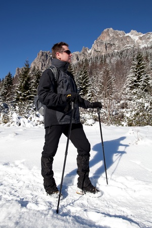 sportive man on the mountain trekの写真素材