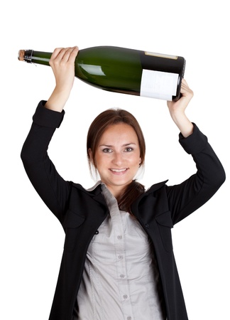 Businesswoman with big champagne bottle  Isolated on white backgroundの写真素材