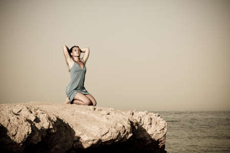 Young woman - body on the beachの写真素材
