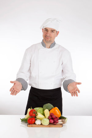 Chef and fresh vegetable on white backgronud