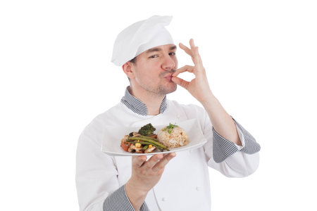Chef making OK gesture after tasteful food  Isolated on white backgroundの写真素材