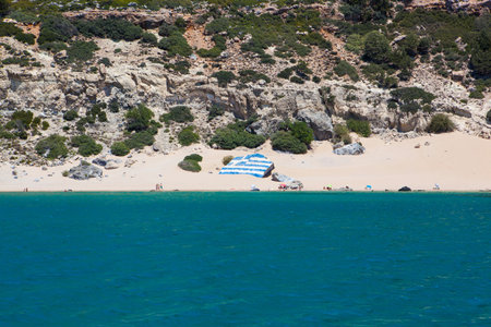 Tsambika beach with Greece flag, Rhodes islandの写真素材
