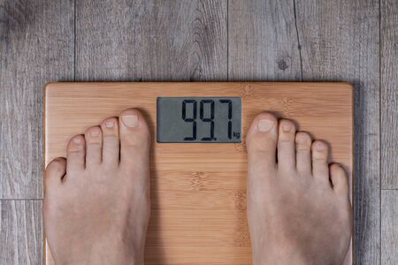 Weight scale and heavy number on the displayの写真素材