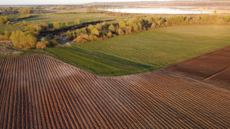 Aerial view with. spring agricultural countryside landscape with unplowed fieldsの写真素材