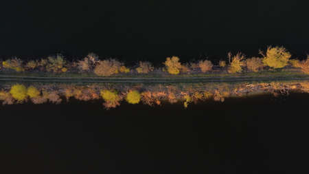 road across the lake view from aboveの写真素材