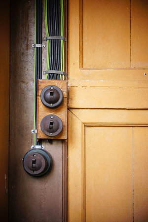 Electrical switch in old English antique style, Malaysia.