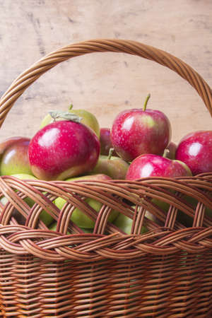 apples in a wicker basketの写真素材