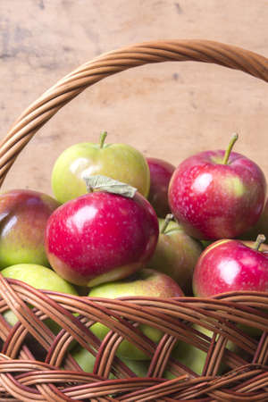 apples in a wicker basketの写真素材