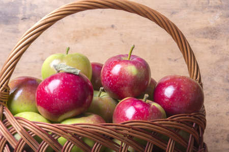 apples in a wicker basketの写真素材