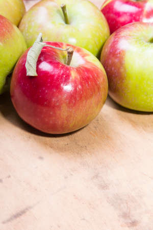 apples on a wooden backgroundの写真素材
