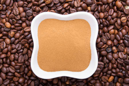 coffee powder on coffee beansの写真素材