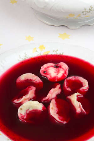 Red borsch with uszka, traditional Christmas Eve dishの写真素材