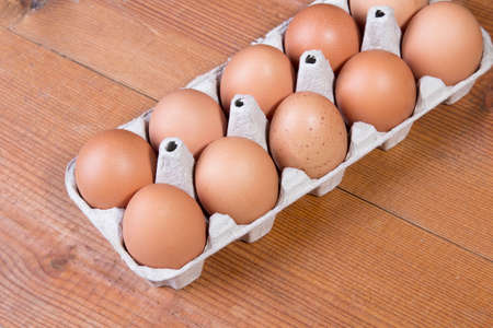 eggs on a wooden tableの写真素材