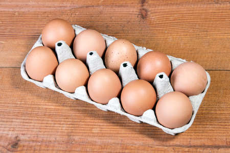 eggs on a wooden tableの写真素材