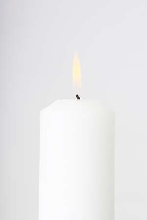  white candle on a light の写真素材