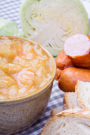 Bigos, sauerkraut and sausage stew with ingredients の写真素材